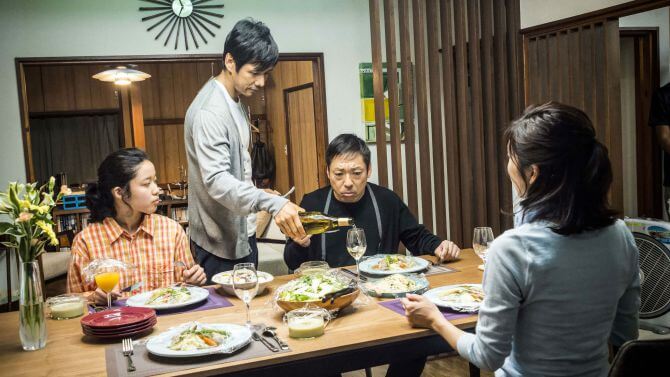 A Japanese family enjoy dinner
